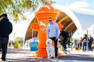 dog and owner attend puptopia festival