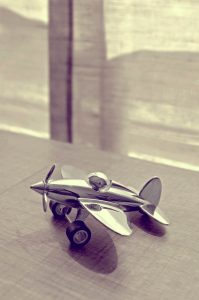 Little silver toy plane