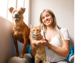 Austin pet sitter with dog and cat during in-home pet sitting